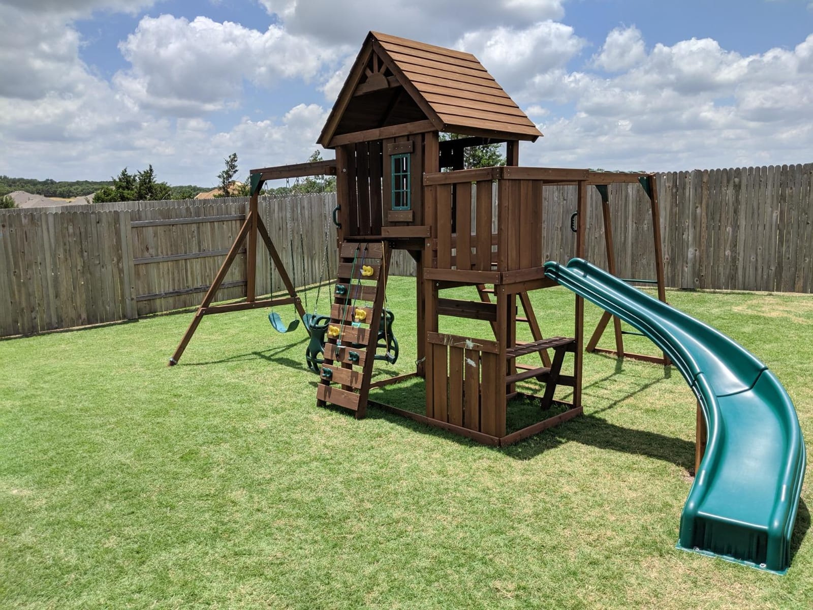 Swing-N-Slide PB 8272 Cedar Brook Wooden Swing Set Play Set with Two Swings, Slide, Monkey Bars, Picnic Table & Glider, Green customer photo 1