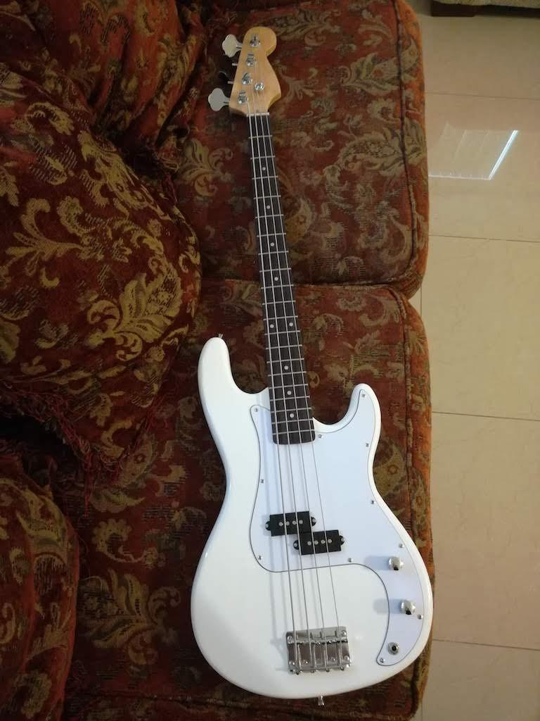 Glarry Electric Bass Guitar Full Size 4 String Rosewood Basswood Fire Style Exquisite Burning Bass (Red) customer photo 2