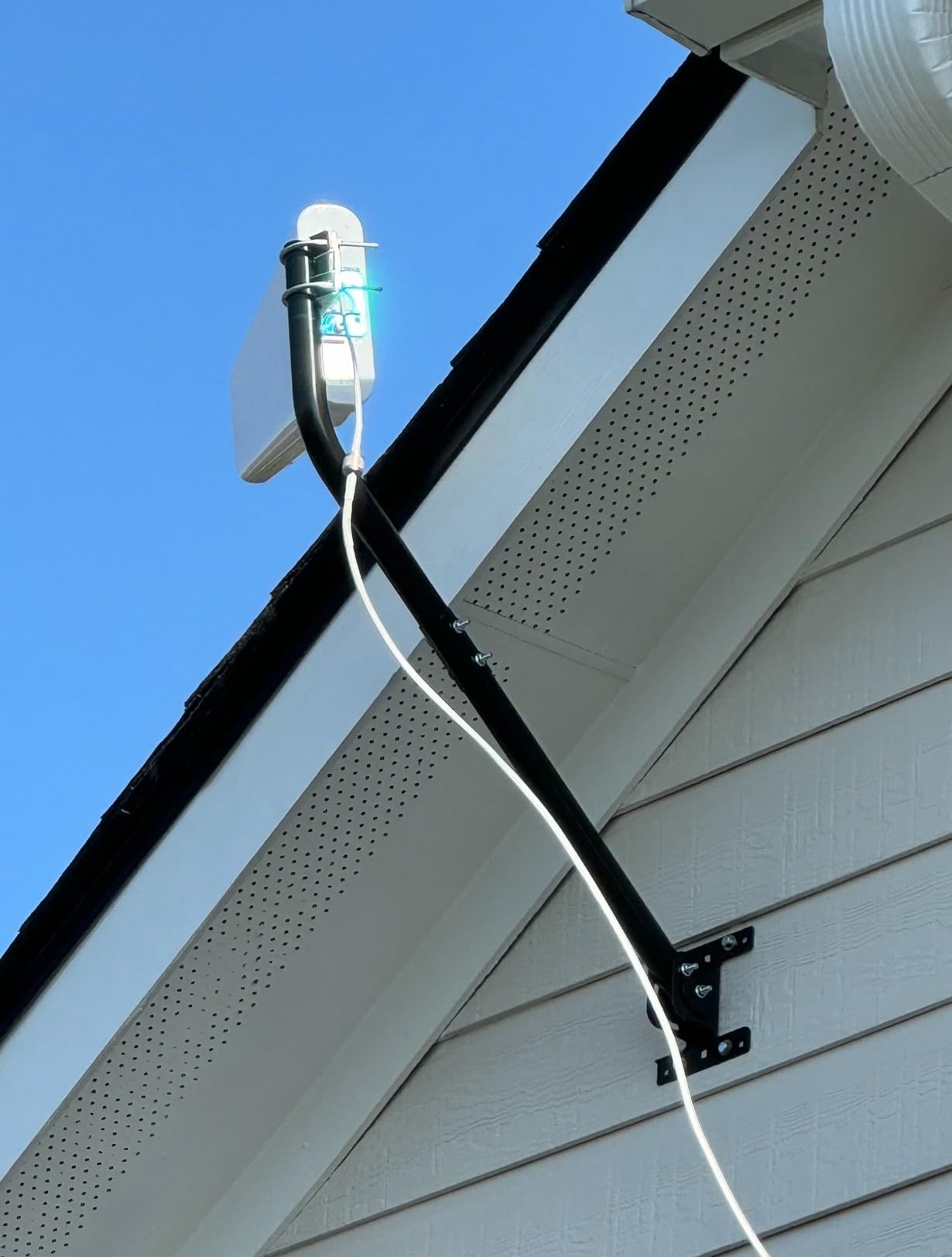 Universal Antenna Mounting Pole for Weather Station, 1.25 x 33.25 in J-Pole | Adjustable Angle, 1.5 mm Steel Mast, 2 mm Bracket and Pivot Lock Provide Rigid Wall, Eave or Roof Support, Hardware Included customer photo 1