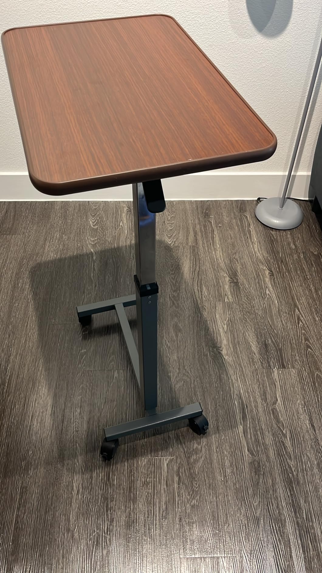 WOTURE Pneumatic Adjustable Overbed Bedside Table with Wheels - Hospital & Home Use, Medical Bed Table, Mobile Standing Desk, Rolling Laptop Cart, Non Tilt Surface(23.6 L x 15.7 W, Walnut) customer photo 1