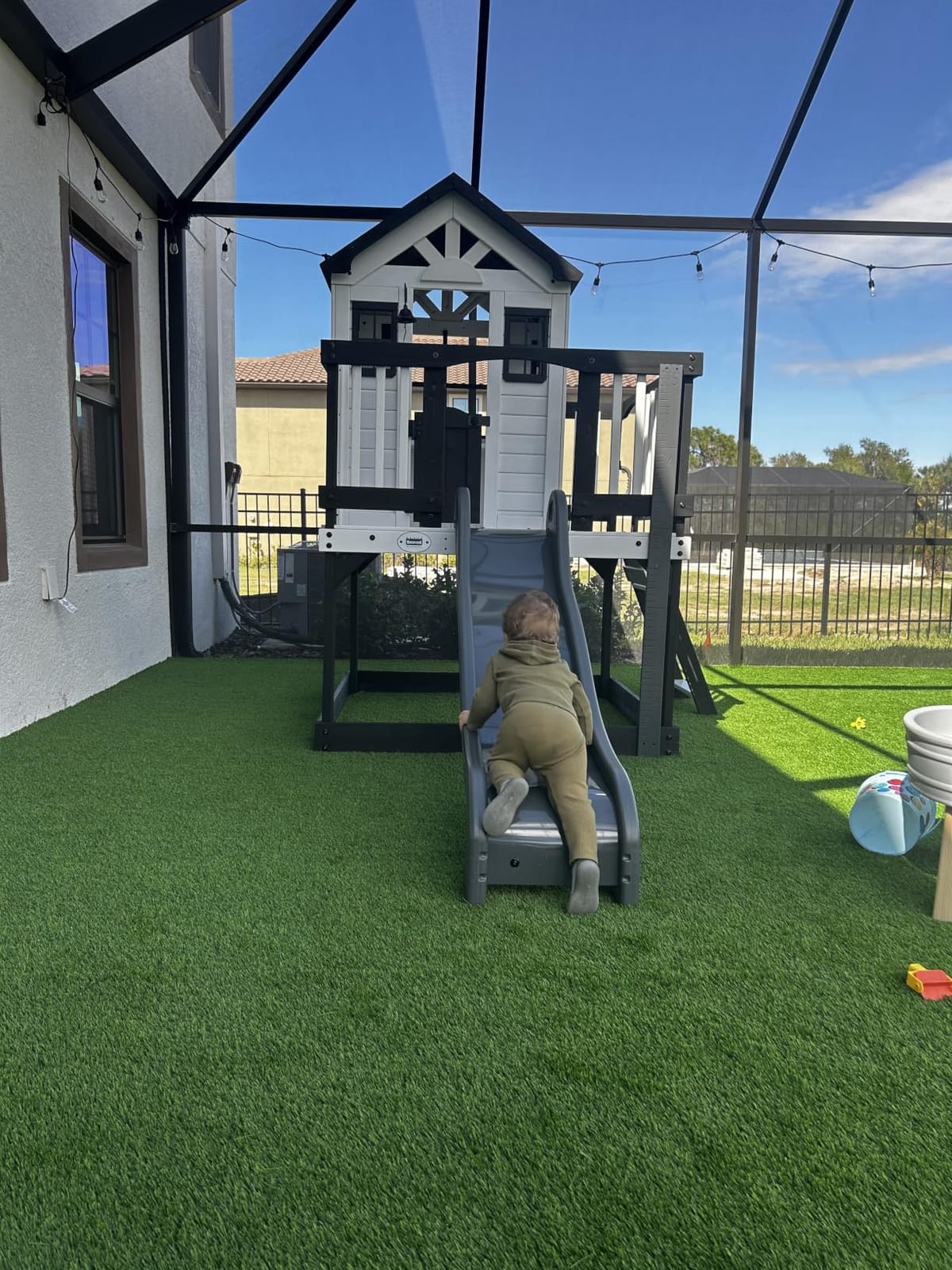 Backyard Discovery Echo Heights Elevated Cedar Wooden Kids Playhouse with Wave Slide, Play Kitchen, Wrap-Around Deck, Flat-Step Ladder, Half Door, Windows, Bell, and Growth Chart for Outdoor Play customer photo 2