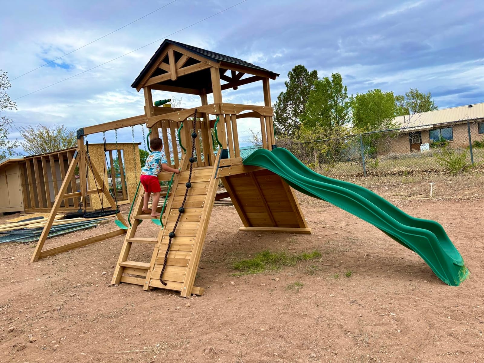 Backyard Discovery Endeavor II Cedar Wood Swing Set with Wave Slide, Play Deck, Double Rock Wall, Picnic Table, Climbing Wall, Belt Swings, Web Swing, Toy Telescope, Step Ladder, Outdoor Playset customer photo 1